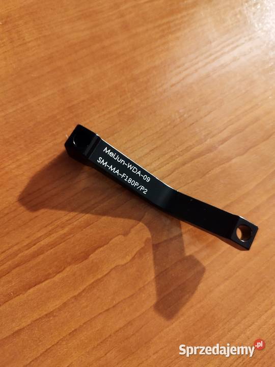 Adapter zacisku hamulca Występ
