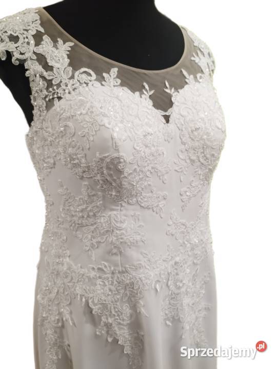 Wyjątkowa sukienka ślubna z Bridal cape 4XL48 śląskie Myszków