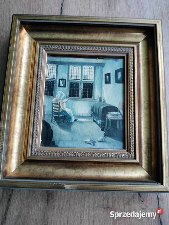 Mały obraz w złoconej ramię kobieta czytająca Choszczno