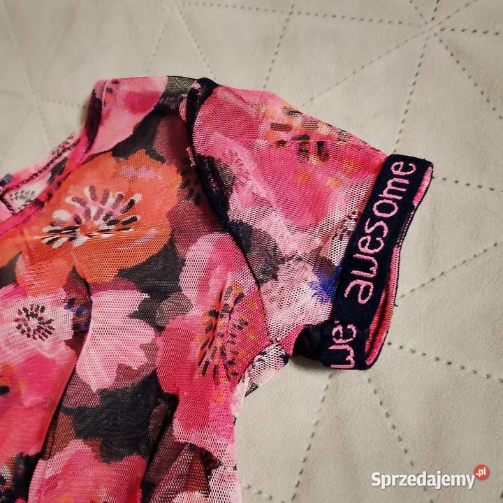 Spszedam sukieneczke w kwiatuszki AWESOME bez Zaścianki sprzedam