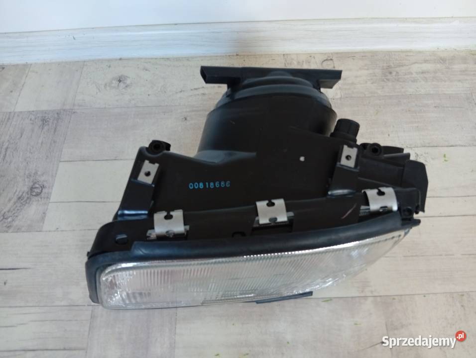 Audi 100 C4 9094 reflektor przedni lampa lewe Łódź