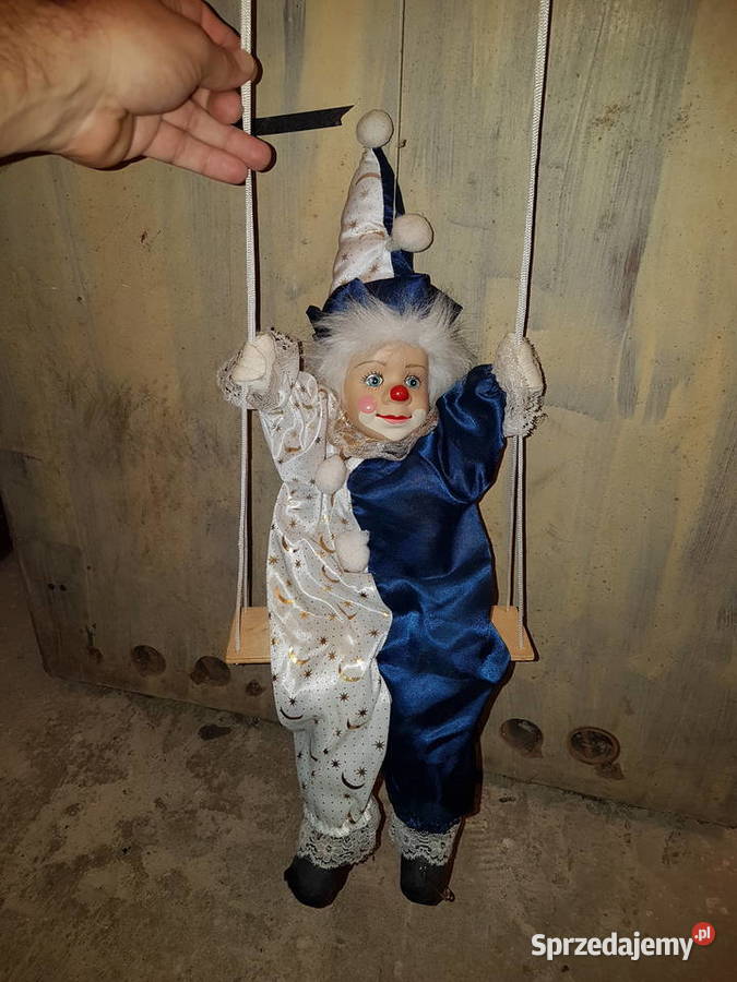 Pajacyk na chustawce z porcelanowa głową Mielec