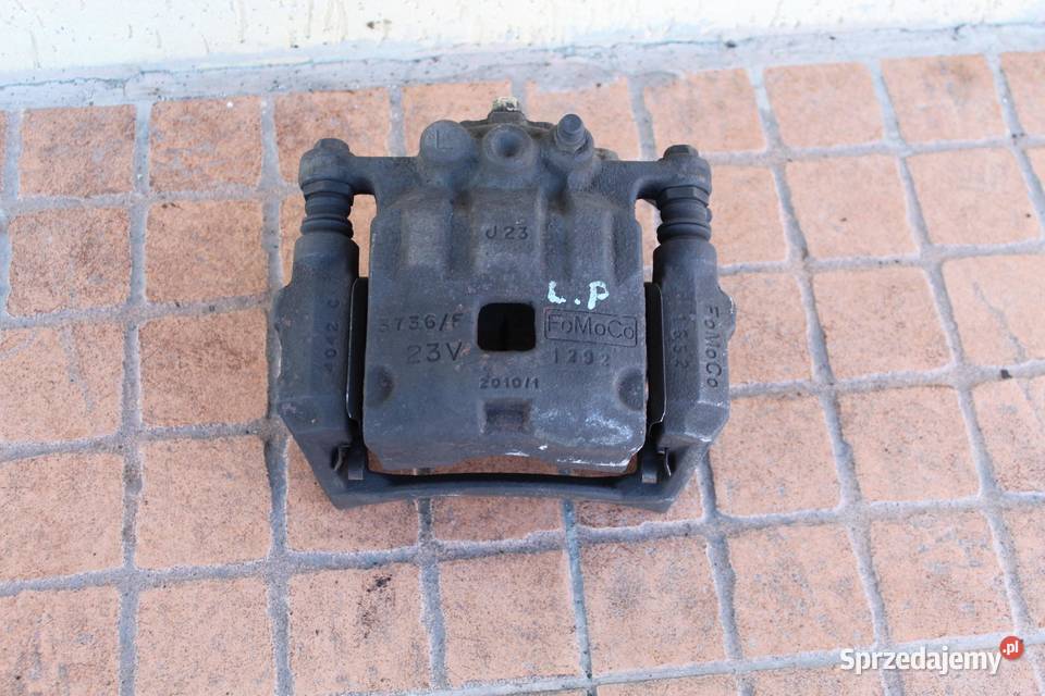 ZACISK HAMULCOWY LEWY PRZÓD FORD FIESTA MK7 16