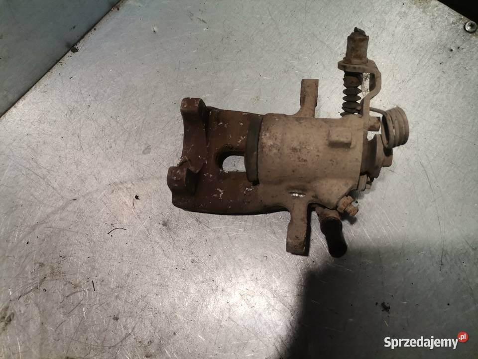 ZACISK HAMULCOWY LEWY TYŁ OPEL ASTRA III H 19 Nowy Sącz