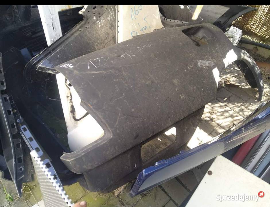 W124 prawy tylni błotnik nowy oryginalny sedan Przeźmierowo