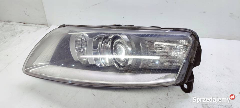 REFLEKTOR LEWY AUDI A6 C6 4F0941003BC SKRĘTNY UK Przystajń