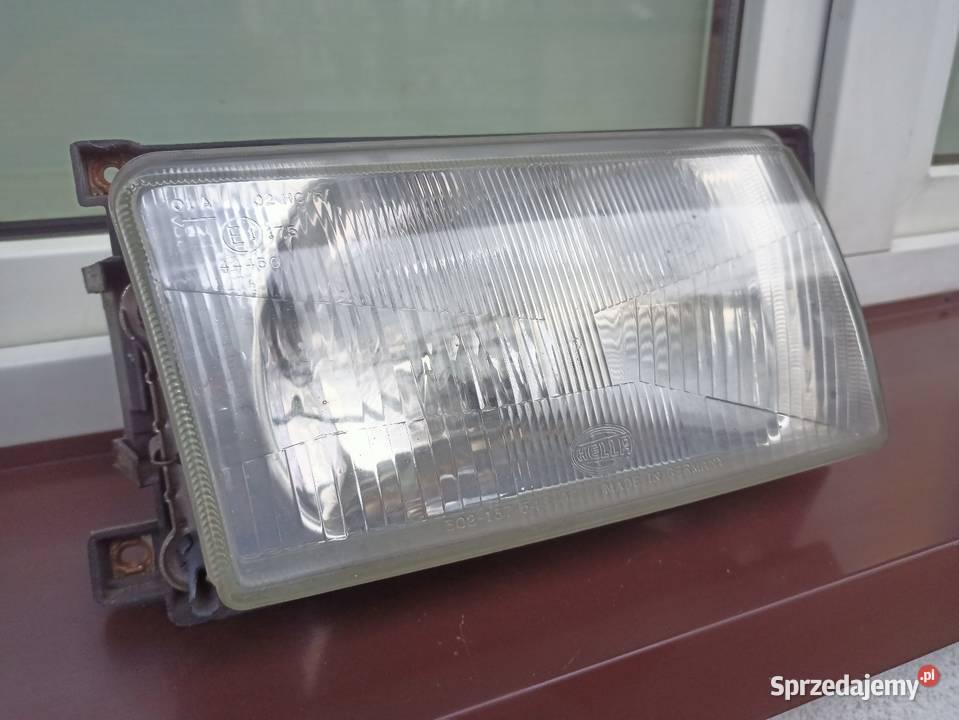 VW Polo III 86c2f lampa przednia prawa reflektor Sieradz