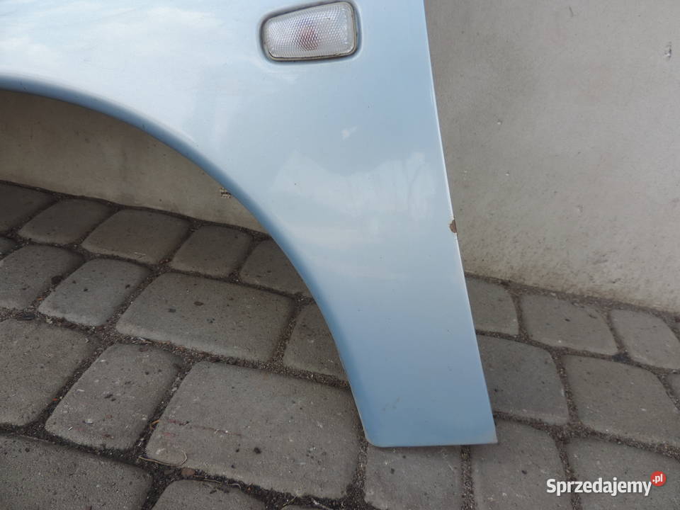 BŁOTNIK LEWY PRZÓD CITROEN BERLINGO I KOLOR KLHA osobowe Nowy Sącz