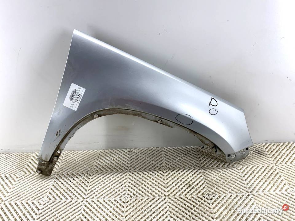 BŁOTNIK PRAWY PRZÓD VW TIGUAN SUV 0718 SREBRNY Błotniki