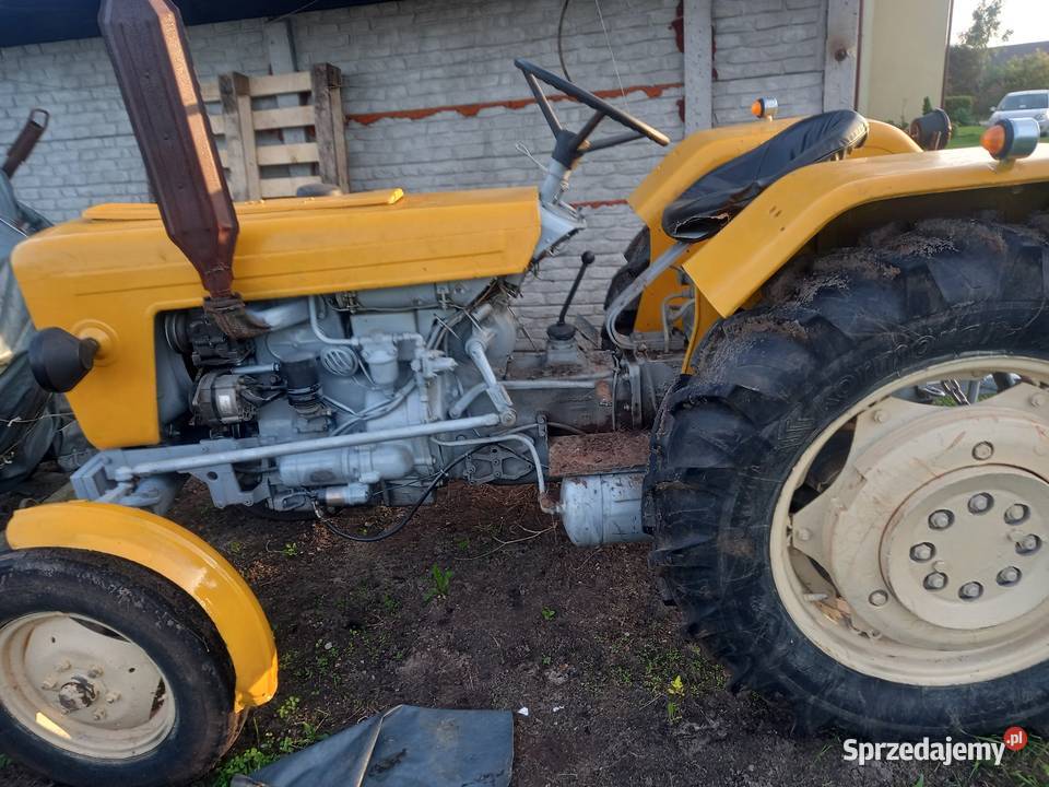 Podnośnik uszkodzony i trochę podnosii kopci Ciągniki