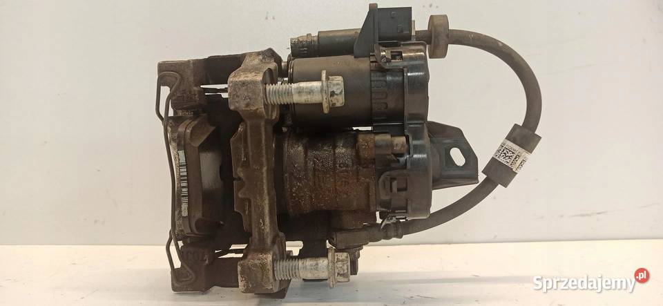 VOLVO V60 CC ZACISK HAMULCOWY LEWY TYŁ 32287433 sprzedam