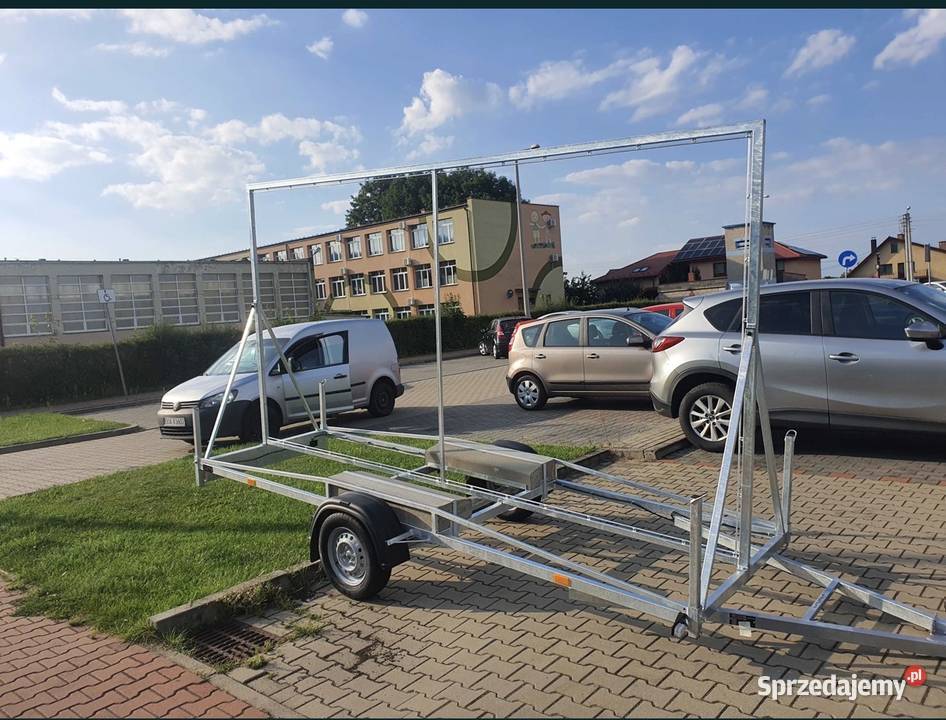 Przyczepa reklamowa pod baner burtowe Marki