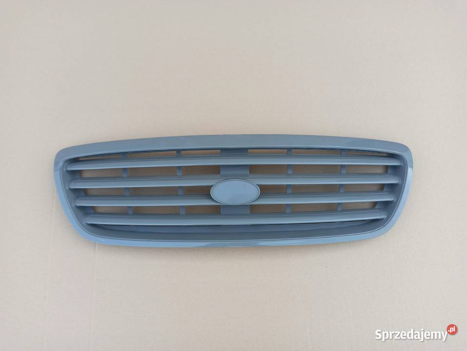 KIA CARNIVAL I GRILL ATRAPA EMBLEMAT OK53A50710 Bieleń