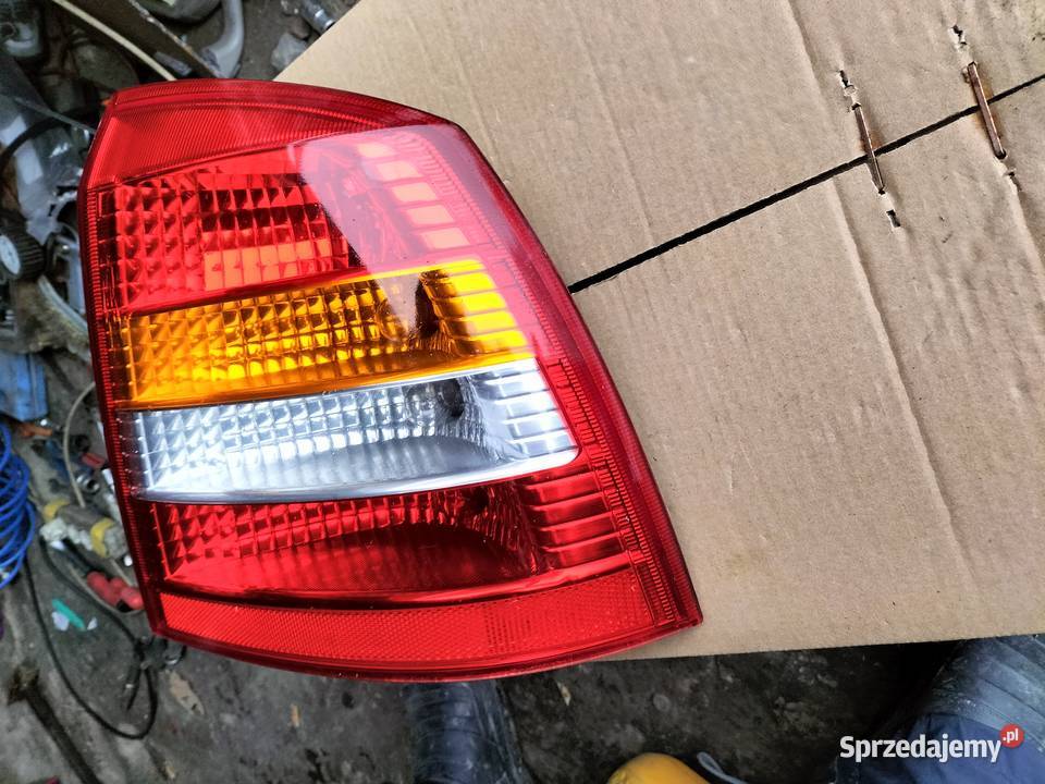LAMPA TYŁ TYLNA PRAWA OPEL ASTRA II G 90521544 Oświetlenie Kamień-Kolonia