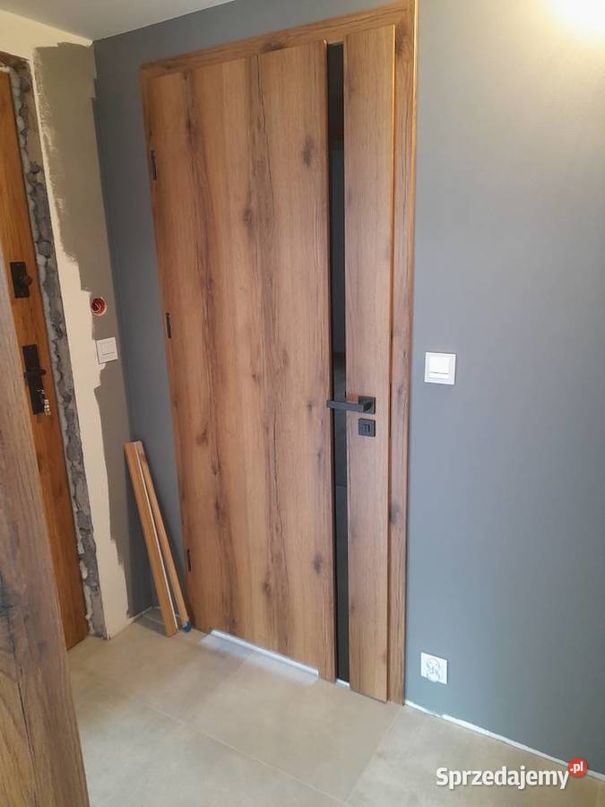 Montaż drzwi I paneli deski podlogowej Kraków