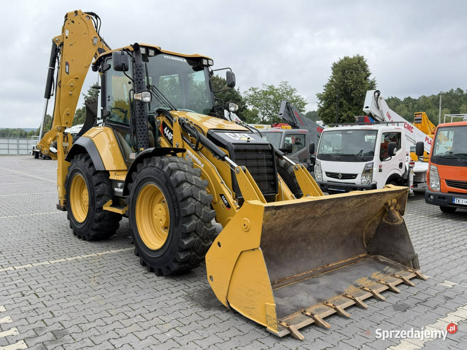 na równych kołach Caterpillar 444F Sterowanie na Koła Widełki sprzedam