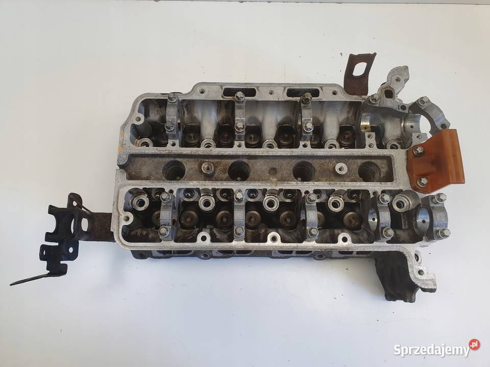 Opel Corsa D 12 16V GŁOWICA CYLINDRÓW 55355430 osobowe Głowice cylindrów