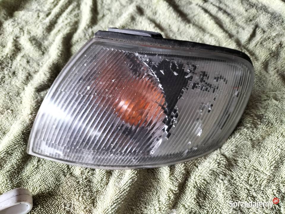 KIERUNKOWSKAZ LEWY Nissan Almera N15 Oświetlenie Motoryzacja Kamień-Kolonia