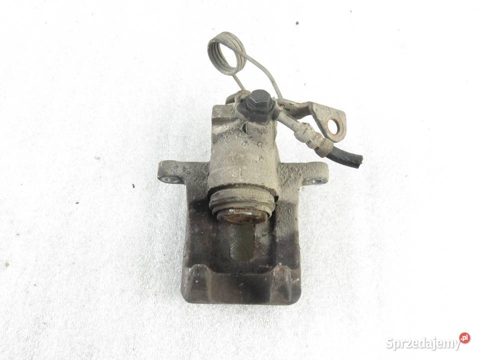 ZACISK LEWY TYŁ AUDI A4 B5 19 TDI