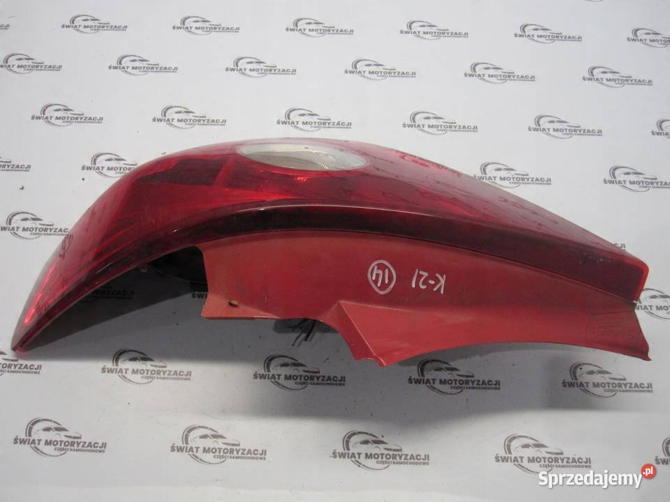 OPEL CORSA D lampa prawa tył 13211841 89038963A