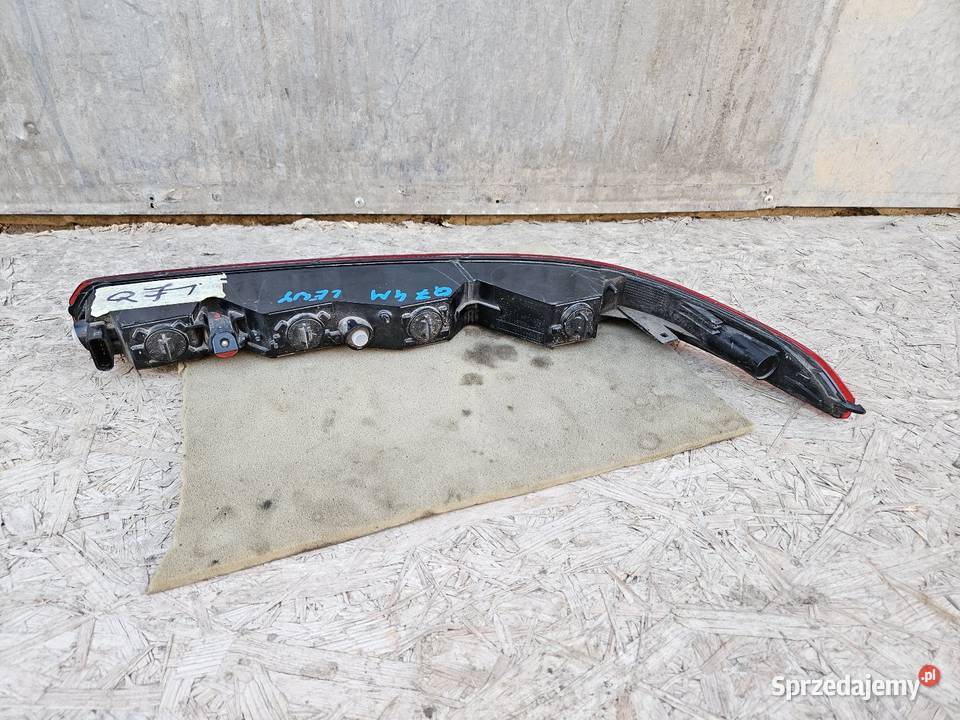 AUDI Q7 4M0 LAMPA W ZDERZAK LEWA TYŁ 4M0945095 Międzychód