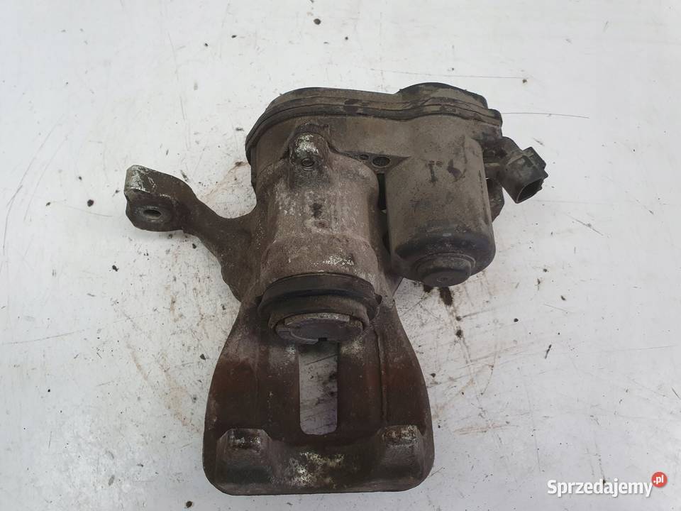 Toyota Corolla XII E21 TYLNY ZACISK HAMULCOWY Rudka