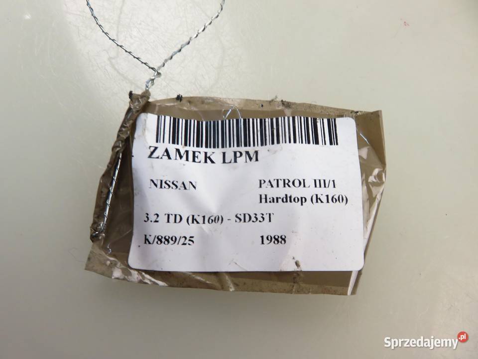 ZAMEK LEWY PRZEDNI NISSAN PATROL III