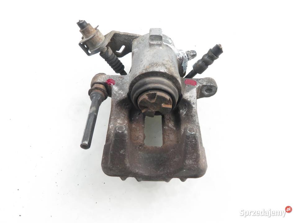 ZACISK LEWY TYŁ VW POLO CLASSIC 14