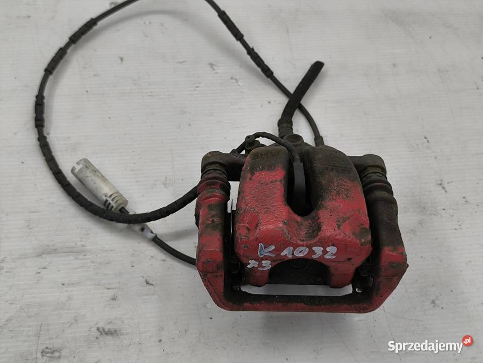 ZACISK HAMULCOWY LEWY TYŁ BMW E90 20i