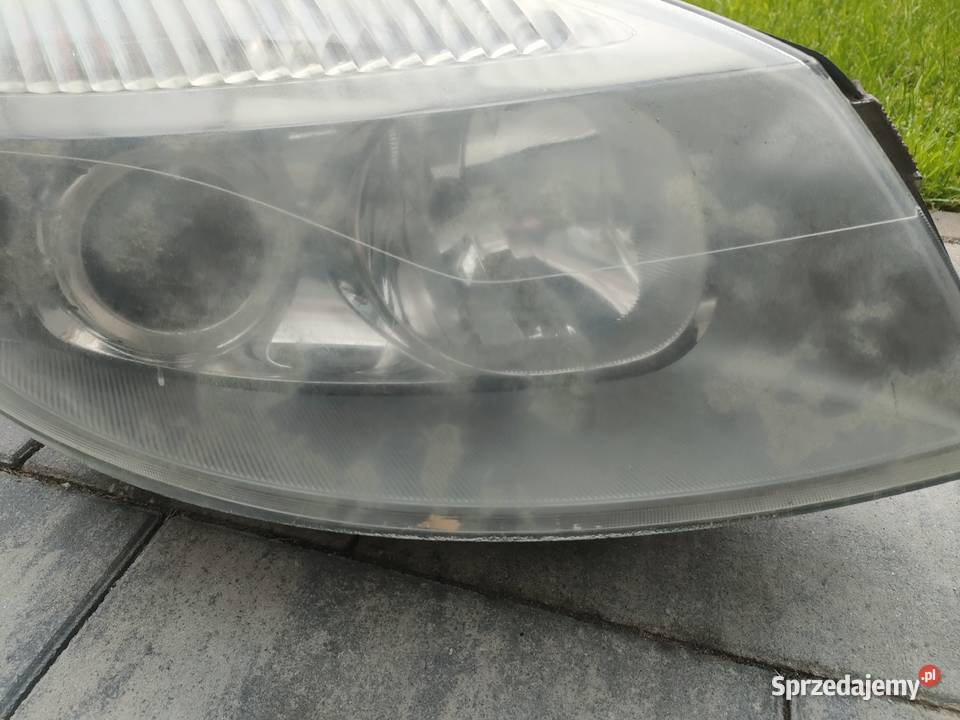 Scenic II lampa prawy przód XENON Swarzędz