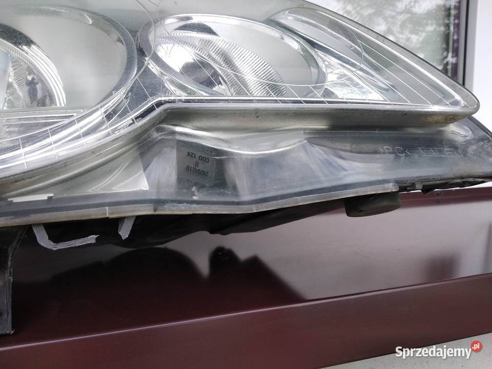 VW Polo 9N LIFT FL lampa przednia prawa Sieradz