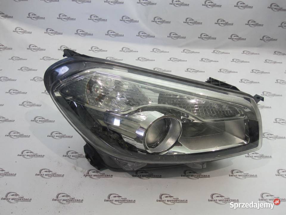 NISSAN QASHQAI I J10 LIFT 10r lampa prawa przód