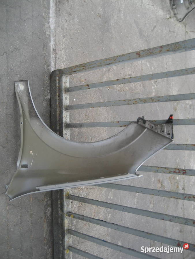 opel astra III h 0412r błotnik przód prawy