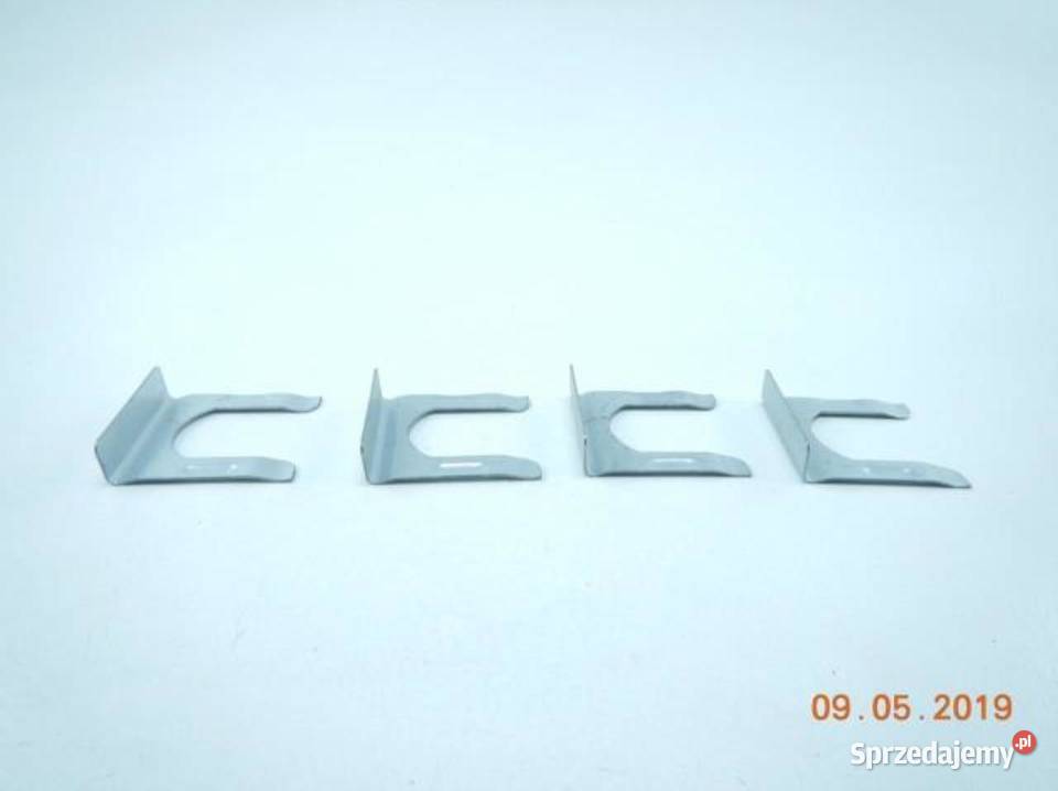 MOCOWANIE WKŁADKI ZAMKA KLAPY FORD SIERRA 8793 Uchwyty fabryczne