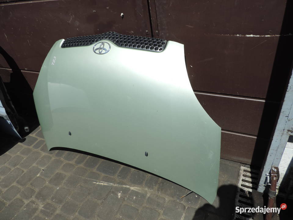 TOYOTA YARIS 1 I KOLOR 6Q2 MASKA POKRYWA SILNIKA osobowe Nowy Sącz