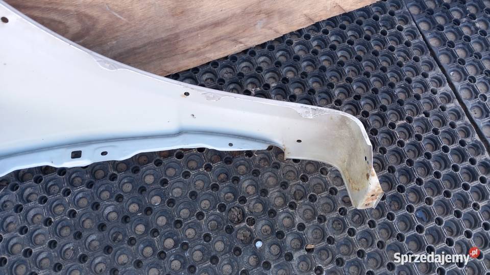 SUZUKI SX4 BŁOTNIK PRZÓD LEWY ZCC Zbierkowo