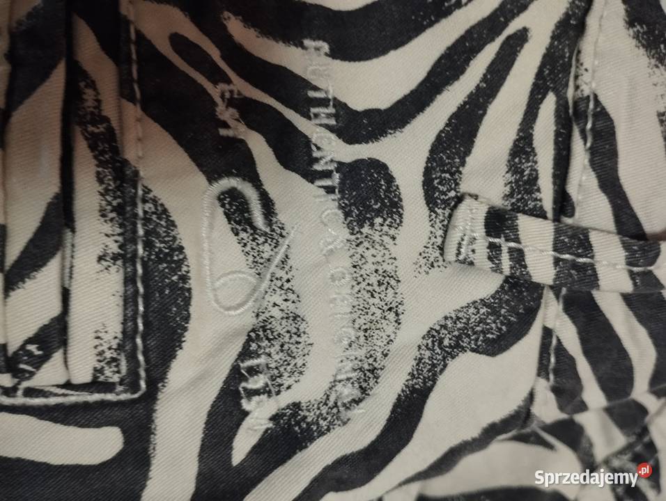 Stylowe spodnie LINDEX w modny wzór zebry Mysłaków