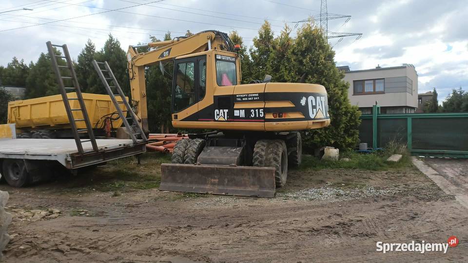 Koparka kołowa Caterpillar cat m315 2002r stan Koła Motoryzacja Śmigiel