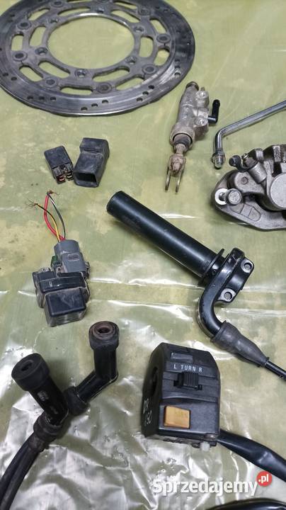 Błotnik lampa cewka WN linka rolgaz pompa zacisk Gołaczewy