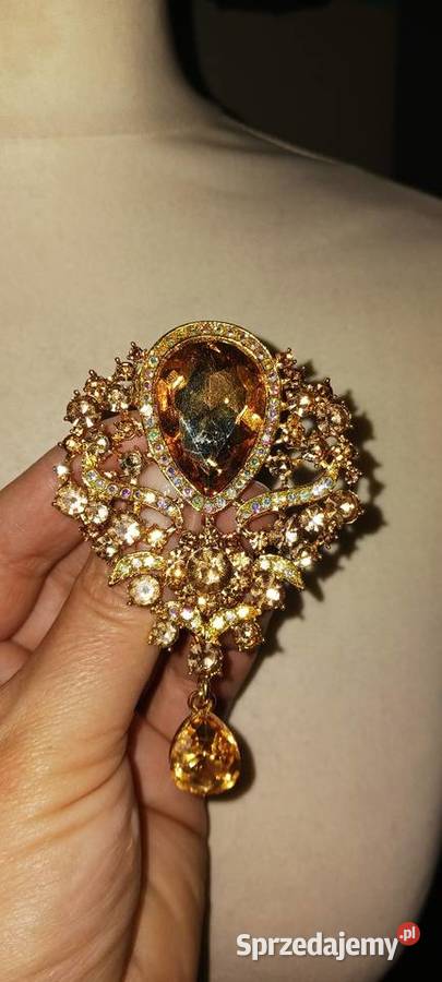 Broszka złota Ostrowąs