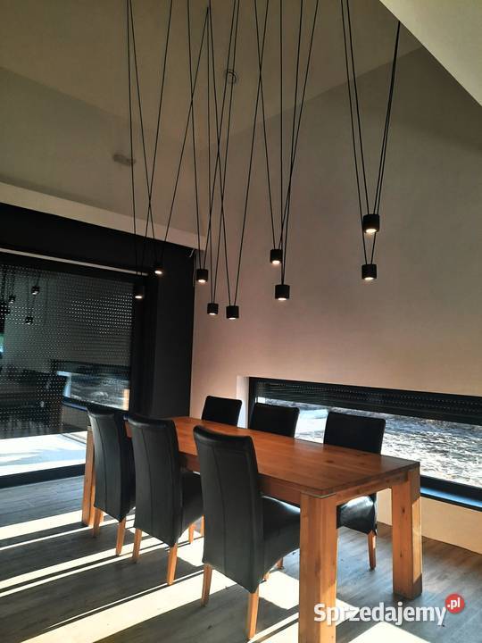 Długa lampa wisząca na skośny strop na antresole Rzeszów