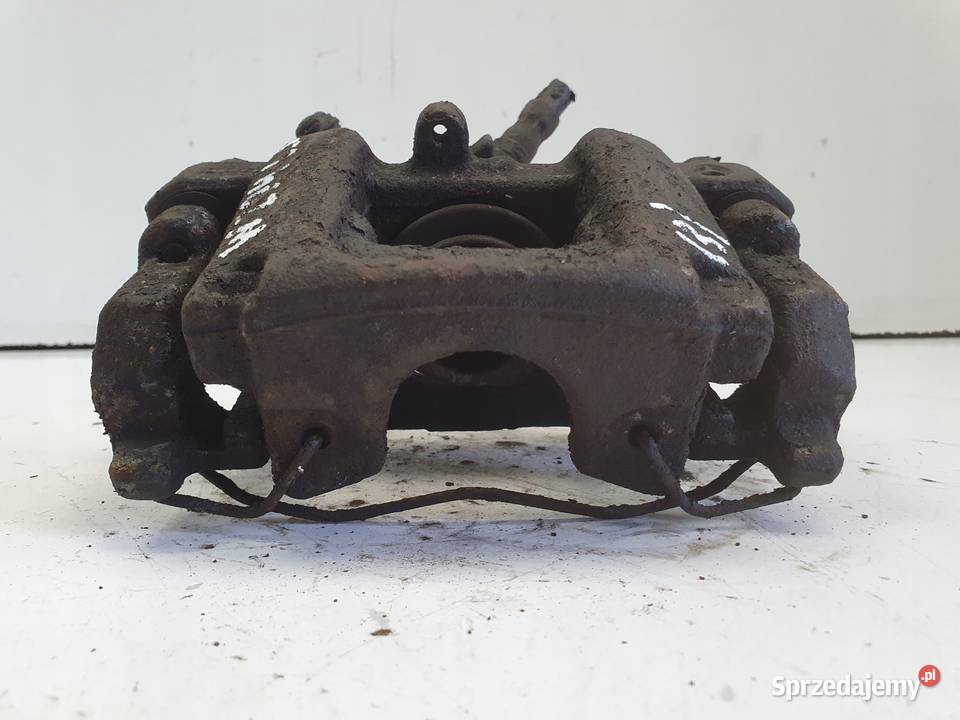 Mercedes W204 LEWY TYLNY ZACISK HAMULCOWY tył osobowe