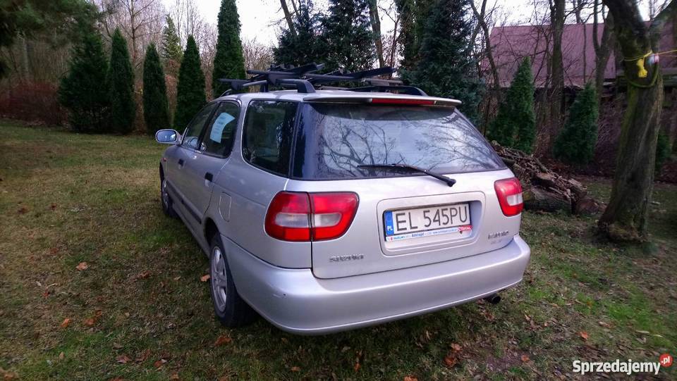 Suzuki Baleno kombi welurowa tapicerka Łódź