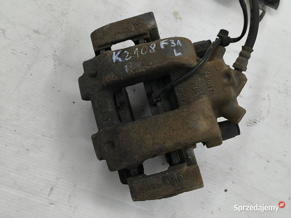 ZACISK LEWY PRZÓD BMW F31 20D LIFT Zaciski i jarzma