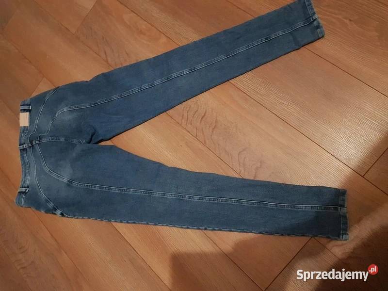 Jeansy damskie Laurie Slim Fit rozmiar 42 Spodnie Moda i Styl Trąbki Wielkie