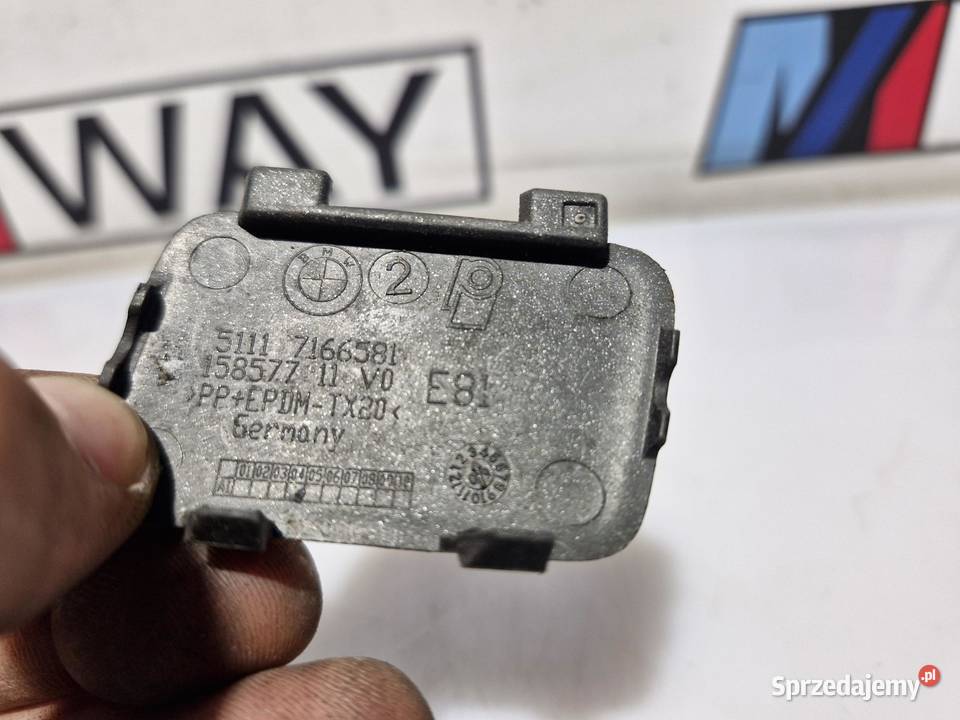 BMW E81 E87 ZAŚLEPKA HAKA ZDERZAKA PRZÓD 7166581