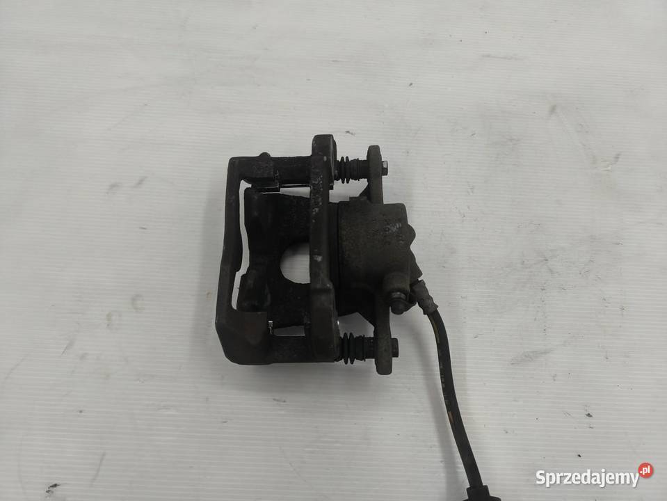 ZACISK PRAWY TYŁ BMW 1 E87 E81 LIFT 16