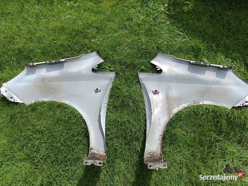 Blotnik przod opel corsa d kod lak Z474 Błotniki