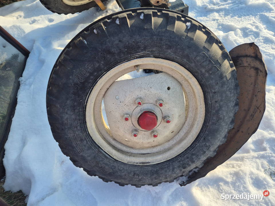 Przednia oś Ursus C330 kołyska koła błotniki Bucze