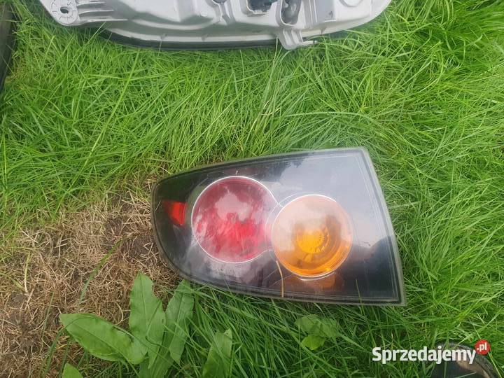 Lampa tylna lewa w błotnik narożna Mazda 3 BK Kraków sprzedam